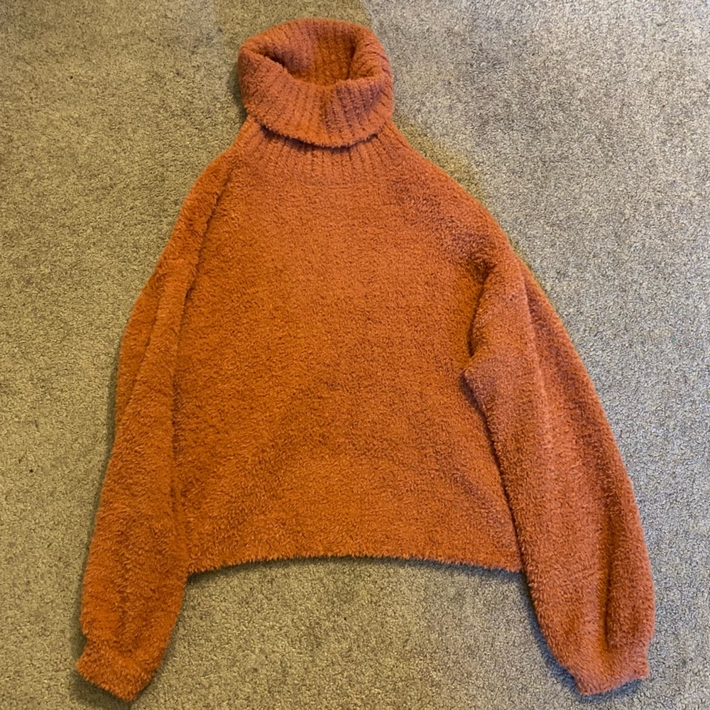 Rust/faded red color